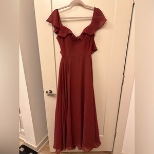 Bridesmaids dress worn once; size 4, and the color is sangria